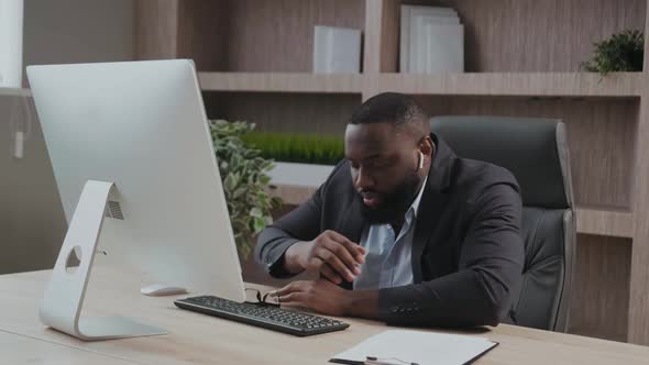 African American Tired Deprived Businessman Feeling Lack of Sleep Having Nap at Workplace Black alt