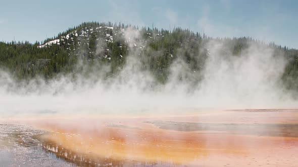 Epic View of Steaming Geyser Grand Prismatic Basin in Yellowstone National Park alt