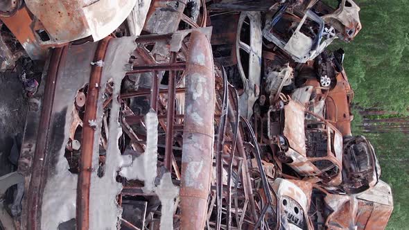 Vertical Video of the War in Ukraine  Burnt Cars in Irpin alt