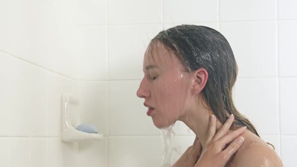 Woman Showering Bathroom alt