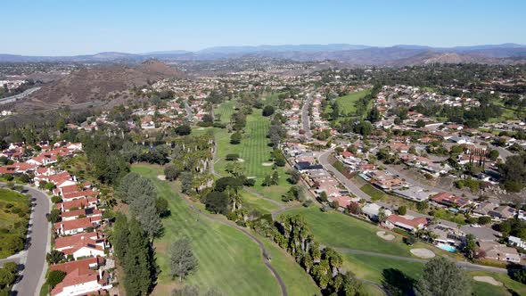 Aerial View of Golf in Residential Neighborhood in an Diego County alt