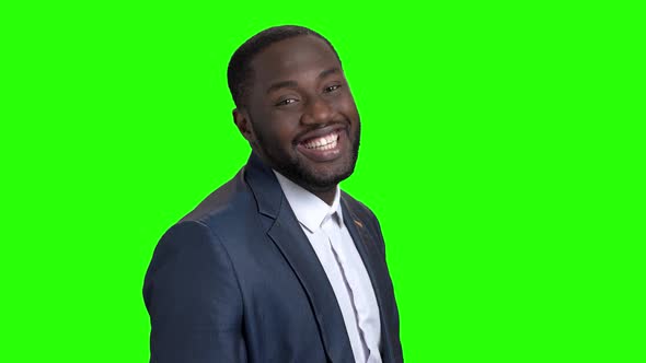 Smiling Macho-man on Green Screen. alt