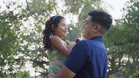 Daughter and Father Look at Each Other alt