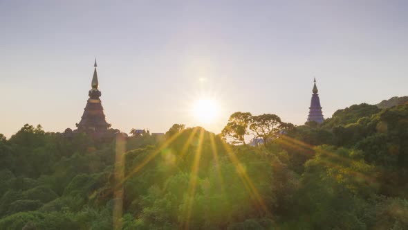 Sunset or sunrise Above the sacred pagoda at Doi Inthanon