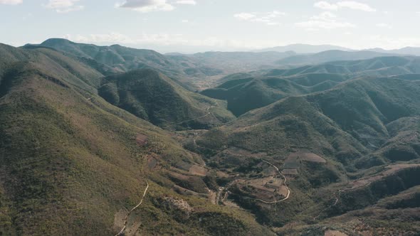 Aerial drone view of green mountains in hierve el agua, Oaxaca alt