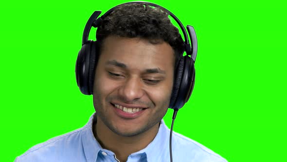 Close Up Happy Cheerful Man Listening Music in Headphones alt