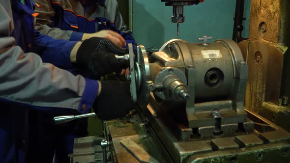 Workers Control and Work on a Lathe alt