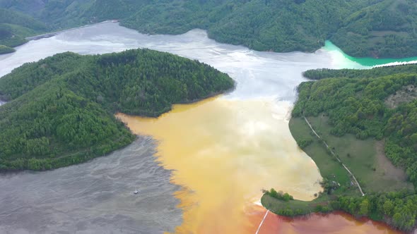 Flying Over a Decanting Lake Full With Mining Chemical Cyanide Residuals alt