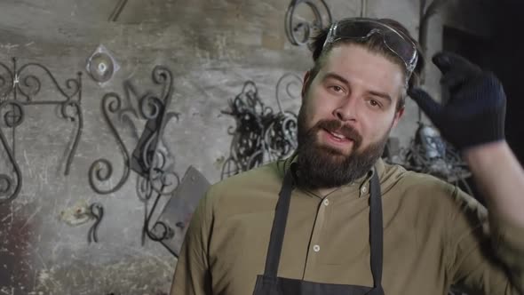 Professional Blacksmith in Workshop alt