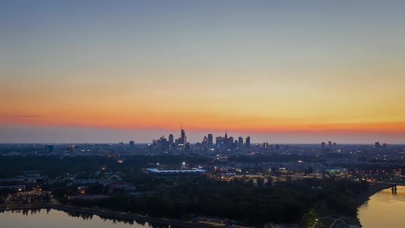 Aerial Motion Timelapse Hyperlapse Modern Downtown Financial Center After Sunset Dusk Cityscape alt
