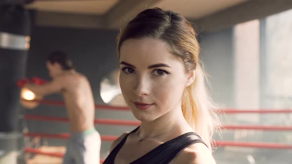 Portrait of Attractive Woman in the Boxing Club alt