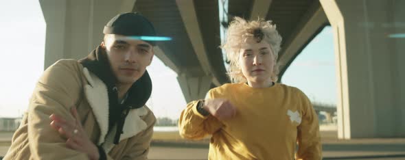 Young Couple Dancing on City Street alt