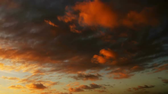 Cloudy sunset. Multicolored. 2 videos in one file. No flicker, no birds.