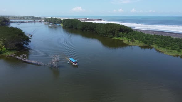 White Luxury Yacht sailing on clean blue sea surface. Aerial Drone Shot Over Speed Boat with small w alt