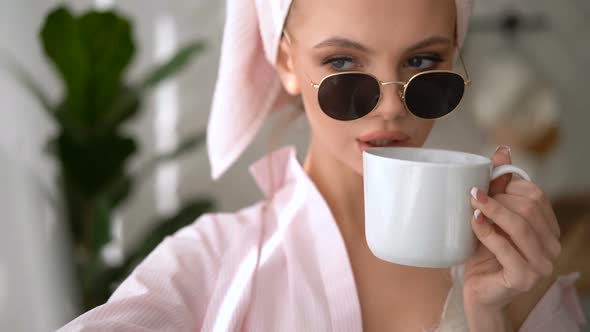 Beauty Girl with White Hair Looking at Camera at Home