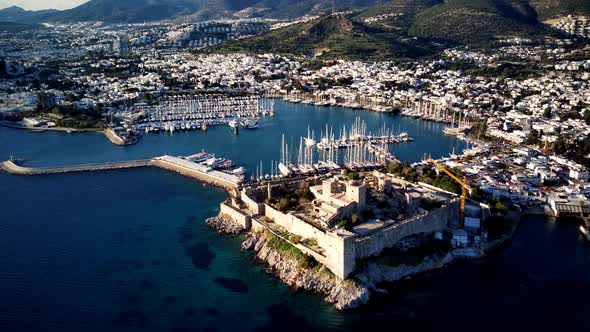 Amazing panoramic view from drone of Bodrum harbour and ancient Kalesi castle in Turkey