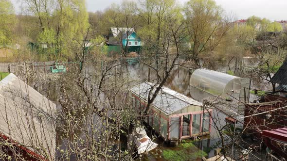 Vegetable Garden Beds In Water During Spring Flood Floodwaters During Natural Disaster alt