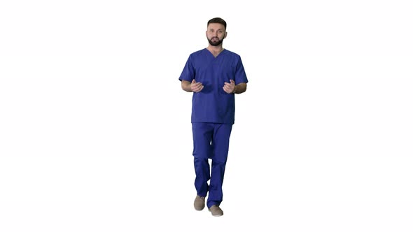 Male Doctor Surgeon Talking While Walking on White Background