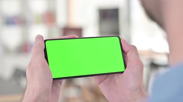 Watching Video on Green Smartphone Screen Chroma Key alt
