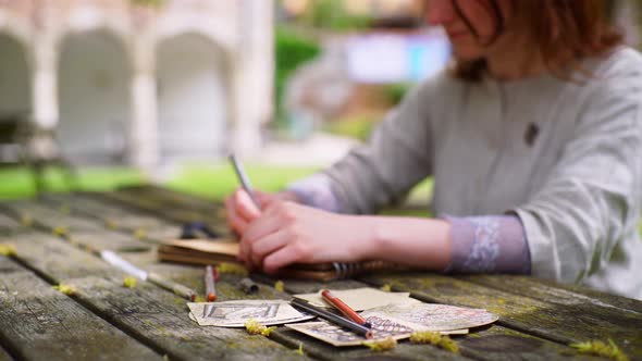 Woman Draw at Nature in Park