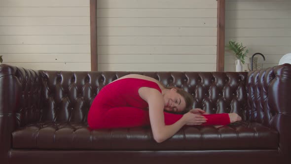 Flexible Woman Doing Yoga Asana Seated Forward Bend alt