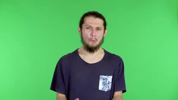 Portrait of a Young Man Looking Into the Camera with a Wow Surprised Expression alt