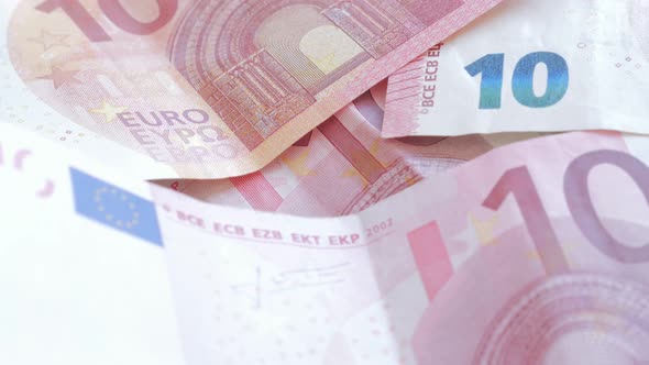 Money Euro banknote background  in the row 4K 2160p UltraHD slow  tilting  footage - 10 and 20 Euro  alt