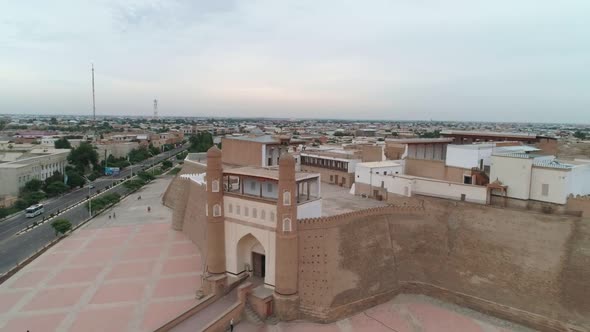 Ark of Bukhara Fortress Filmed By Drone on a Cloudy Day alt