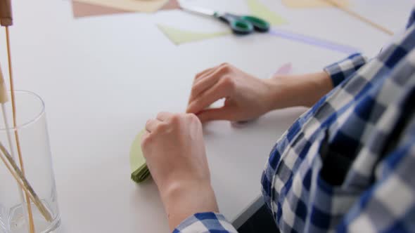 Woman Making Paper Craft at Home alt
