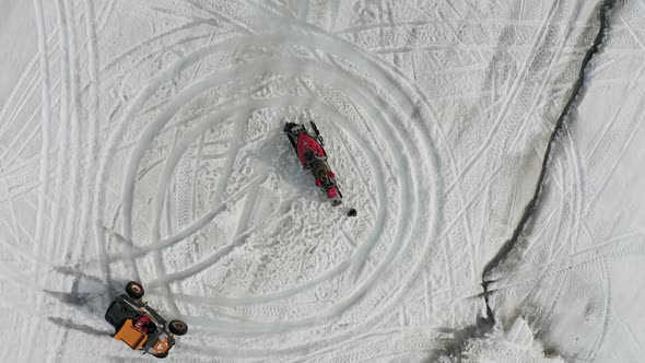 Drifting around a Snowmobile on a glacier alt