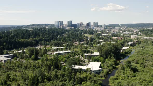 Bellevue Washington Aerial View Above River Facing Skyscraper Cityscape alt