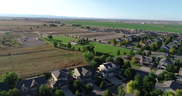 A flight over suburban Colorado while new homes are built in the background. alt