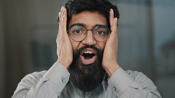 Shocked Smiling Arabian Man Professional Agent Businessman in Eyeglasses Surprised Good News Amazing alt
