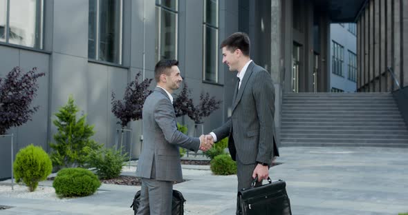 Businessmen Shaking Hands alt