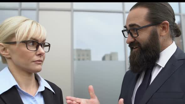 Naughty Male Boss Flirting With Shocked Female Worker Near Office, Harassment