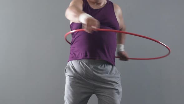Funny Fatty Man Learning how To Twist Hula-Hoop, Wants to Have Thin Waist alt