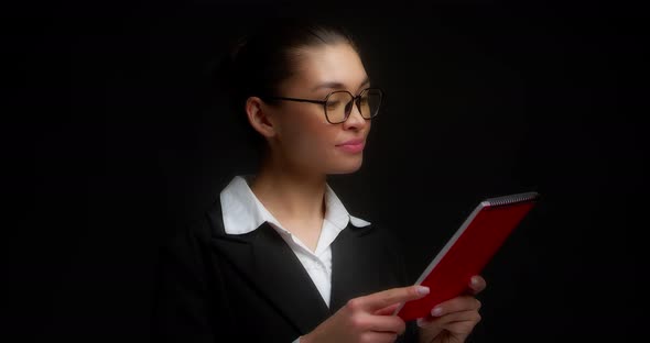 Business Woman Reads the Document Agrees and Gives a Thumbs Up
