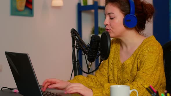 Vlogger Recording Podcast Using Mic at Home Studio alt
