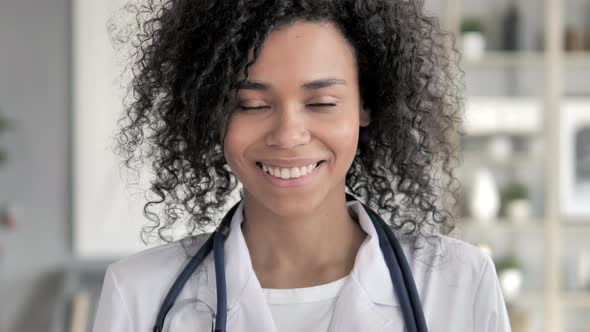 Portrait of Smiling African Lady Doctor alt