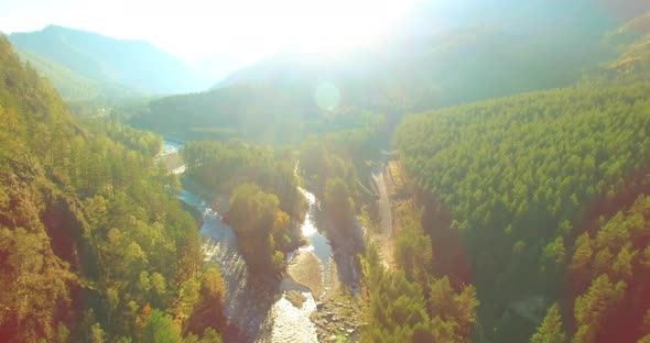 Low Altitude Flight Over Fresh Fast Mountain River with Rocks at Sunny Summer Morning alt