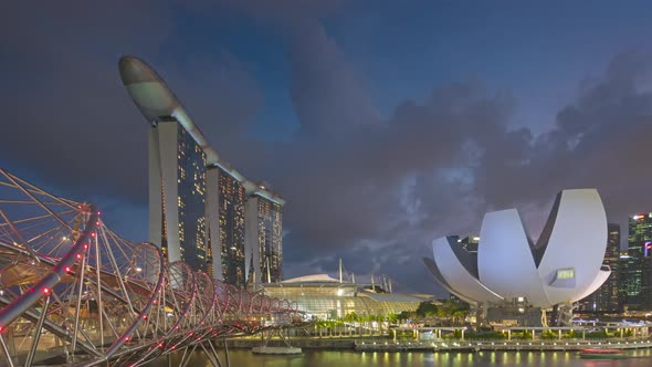 Singapore skyline with Helix Bridge views and the Marina Bay. alt