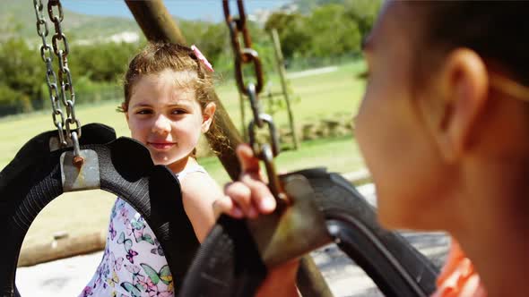 Schoolkids playing in playground alt