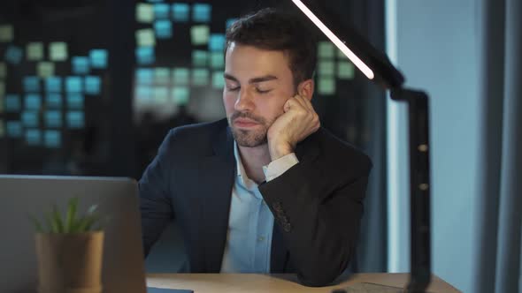 Workaholic at Work Office Manager Works Late a Tired Falls Asleep in the Workplace Works Overtime alt