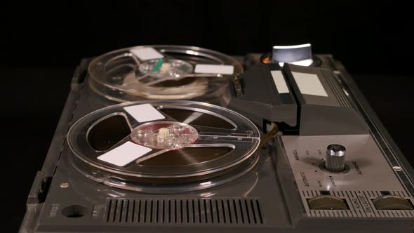 Basic Reel to Reel Tape recorder playing music alt