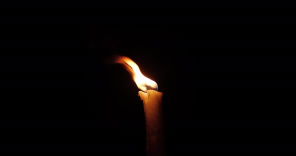 Burning Torch On A Black Background