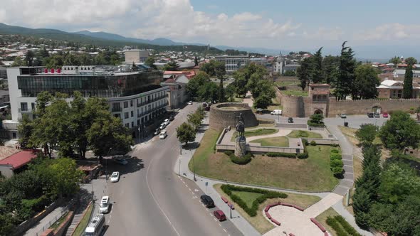 Aerial view of Monument of King Erekle II in Telavi. flying over Batonis Tsikhe alt