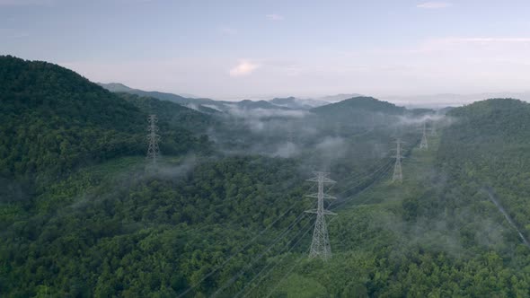 Aerial view Morning scenic on high mountains with electricity pylon.