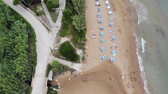 Aerial footage at beautiful small town of St George South in the city of Corfu Greece alt