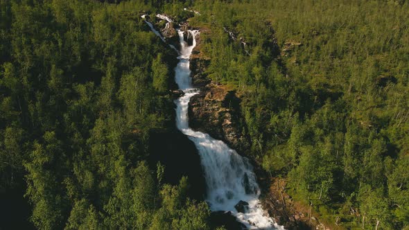 Foamy Streams Of Turelva Over Rugged Cliffs Between Vegetations In Finnmark, Norway. Aerial Drone alt