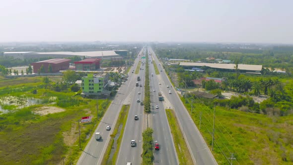 Aerial view of street road with residential buildings, Ratchaburi skyline, Thailand. Urban city alt